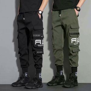 Wholesale Men <b>Tape</b> Loose <b>Binding</b> Pants Casual Trousers Punching Pants Patchwork Loose Cargo Pants Fashion Style - Product Image 3