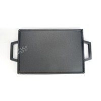 Plaque de cuisson réversible en fonte pré-assaisonnée, double face, avec surface plate et surface grillée côtelée, et deux poignées