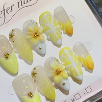 Ensemble de faux ongles en amande faits à la main B633, motifs floraux, citron et pois dorés, pour doigts