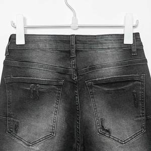 <span class=keywords><strong>กางเกง</strong></span>ยีนส์ขาดเข่าทรงสลิมฟิตสีพื้นคุณภาพสูงสำหรับผู้<span class=keywords><strong>ชาย</strong></span>และผู้หญิง - Product Image 2