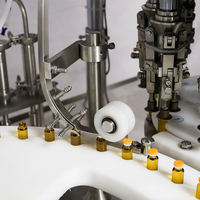 Ligne de production automatique à grande vitesse embouteillage mini machine de remplissage de liquide de bureau automatique pour liquides pour bouteilles en verre