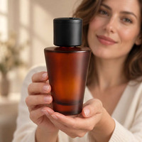 Bouteilles en verre transparentes de 50 ml et 100 ml, vente en gros directe d'usine, flacons de parfum de luxe personnalisés avec buse de parfumeur