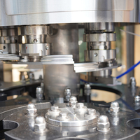 Machine de remplissage entièrement automatique pour bouteilles de verre, de canettes et de bouteilles PET, pour eau pure, eau plate et boissons gazeuses