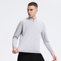 Nueva Camiseta Deportiva de Poliéster para Hombre, con Cierre de Cremallera en el Cuello, Bolsillo con Cremallera en el Pecho Derecho y Manga Larga