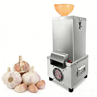Machine à peler l'ail électrique commerciale 25KG/H Haute efficacité Acier inoxydable Facile à nettoyer pour restaurant et transformation alimentaire