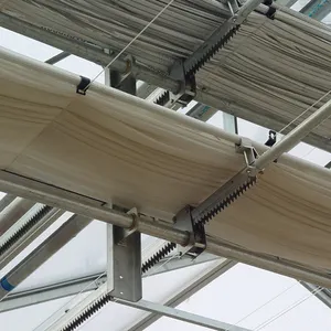 Low cost greenhouse automatic shading system for growing