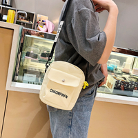 Tas bahu katun tunggal modis ramah lingkungan kustom untuk wanita tas selempang ritsleting lucu dekorasi huruf pola permen