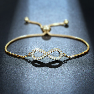Bracciale con ciondolo infinito dorato per donna, regalo di gioielli alla moda regolabile con strass di cristallo - Product Image 1