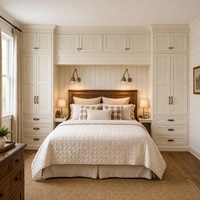 Système d'ameublement de chambre sur mesure intégré avec armoire intégrée, panneaux muraux et rangement au-dessus du lit