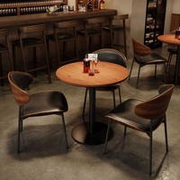 Ensemble de table et de chaises de salle à manger en bois massif de style américain vintage moderne personnalisé, avec des cadres en métal pour une utilisation commerciale dans les bars et les restaurants