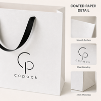 Sacs en papier pour salons de beauté, papier couché blanc 3 mm avec poignées en ruban, emballage personnalisé avec logo pour marques de soins personnels et spas, vente en gros