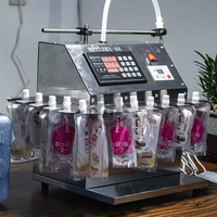 Machine de remplissage de liquides à six têtes semi-automatique pour boissons, vin, boissons gazeuses, jus, lait, liqueur, eau, avec buse debout