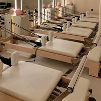 Reformer de Pilates multifonctionnel, durable et portable en bois d'érable pour studio de yoga et usage domestique