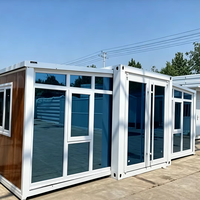 Maison conteneur préfabriquée extensible à double aile avec mur-rideau en verre, 2-3 chambres, mini-villa pliable, design moderne et respirant, complète