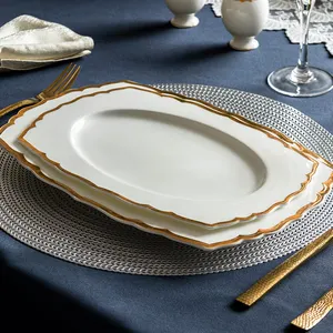 Platos de cerámica hechos a mano, vajilla de borde dorado, diseño lateral de encaje, forma rectangular blanca brillante, plato de China para boda