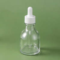 Flacon compte-gouttes en verre transparent, flacon pour essence liquide, flacon d'huile essentielle de 50 ml, flacon d'emballage pour produits de soin de la peau
