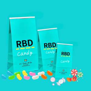 Sacs en papier kraft personnalisés avec logo, fond bleu coloré, pour bonbons et friandises d'enfants, avec lien métallique pour emballage cadeau - Product Image 1