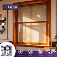 Fenêtre à guillotine simple en aluminium insonorisée EOKO, résistante aux ouragans, à grain de bois, sur mesure et personnalisable