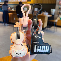 Porte-clés mignon mini piano et violon en cuir PU, breloques de sac, pendentif instrument de musique pour couple, porte-clés de voiture, cadeau tendance, vente en gros