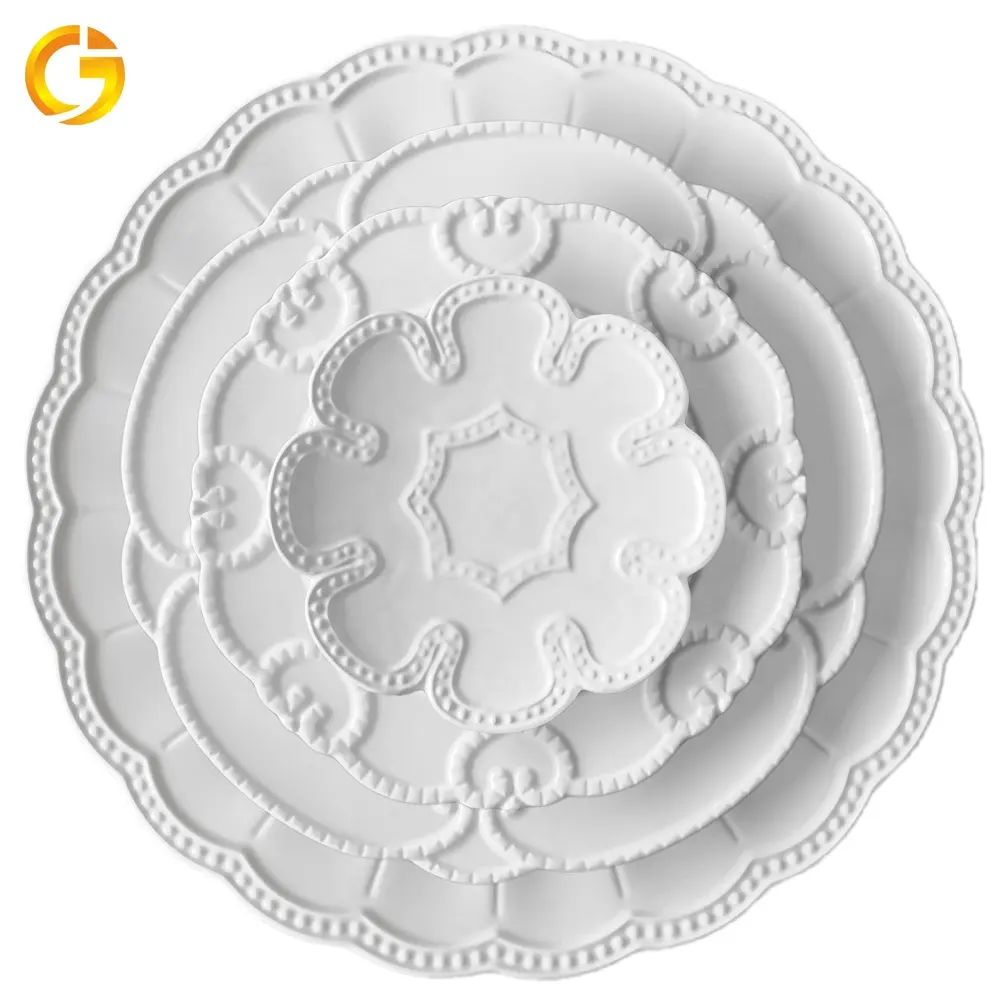 Venta al por mayor en relieve de cerámica, vajilla de boda de porcelana grabado juegos de cena