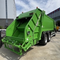 Sinotruk Howo 20 CBM chargeur arrière compacteur camion à ordures 6x4 manuel diesel comprimé déchets comprennent moteur moteur boîte de vitesses vente