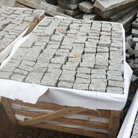 Vente en gros de petits blocs de granit chinois gris pierre polie jardin extérieur parc allée pavage design moderne pierre de galets noirs