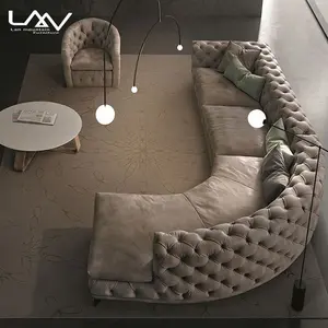 Conjunto de sofá curvo simple de lujo moderno, mueble Seccional de cuero con botón extraíble para sala de estar, Hotel, villa