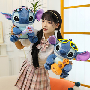 <span class=keywords><strong>Peluche</strong></span> <span class=keywords><strong>musicale</strong></span> Alien bleu avec piano, accordéon, microphone, guitare, créature spatiale, poupée en <span class=keywords><strong>peluche</strong></span>, oreiller, vente en gros - Product Image 3
