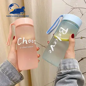 wholesale 600ml large capacity frosted clear Matte glass water bottles with silicone hand rope for students