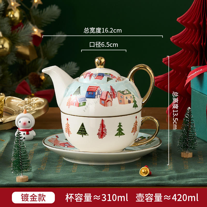 Juego de tetera chapada en oro casa de nieve