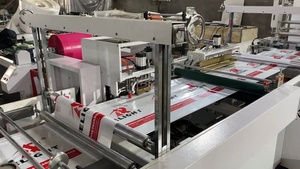 PE PP Polipropileno Die Cut Handle Plastic Bag Machine Remendo Automático Soft <span class=keywords><strong>Loop</strong></span> Handle Carry Shopping Bag Making Machine - Product Image 3