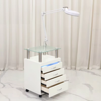 Chariot de Salon Pliable en Métal avec Verre Trempé, Quatre Tiroirs, Miroir Grossissant LED et Lampe de Désinfection UV