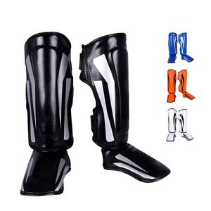 Protège-tibias et protège-pieds en cuir PU de haute qualité AOFIT pour le kick-boxing et le Muay Thai, avec logo personnalisé, pour la protection des mollets et des jambes - Product Image 1