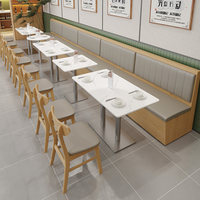Table et chaises de salle à manger modernes en bois massif avec plateau en pierre, mobilier de restaurant personnalisable pour restaurants commerciaux et cafés.