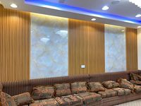Panneaux muraux européens en PVC Panneaux muraux cannelés modernes en WPC pour villa hôtel Panneaux muraux intérieurs ignifuges imperméables