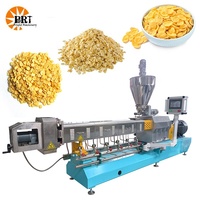 Ligne de production de machine d'extrudeuse de presse de fabrication d'aliments de casse-croûte de flocons de maïs de céréale de petit déjeuner