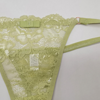 Tanga de encaje antibacteriano de talle bajo sin costuras para mujer con patrón floral bordado de nailon y elastano