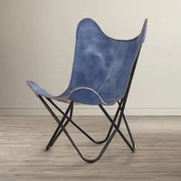 Fauteuil d'appoint papillon en cuir véritable artisanal de luxe avec structure métallique durable, disponible en plusieurs couleurs pour le salon.