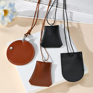 Pochette de rangement en cuir pour le cou, forme ronde et trapézoïdale, portable pour écouteurs, lunettes, clés, couleur ambre et noir, design avec surpiqûres - Product Image 1