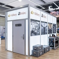 Stand d'exposition modulaire 30x30 en îlot avec affichage LED SEG et salle de réunion pour l'US Aircraft Expo Palo Alto 2027