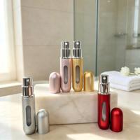 Atomiseur de parfum portable en aluminium OEM en forme de capsule, flacon rechargeable avec fenêtre inférieure, logo personnalisé