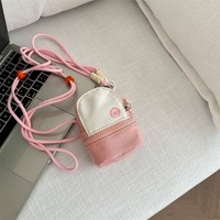 Nylon pièces sacs cartable sac à main Mini porte-clés pendentif Portable garçons et filles casque documents sacs de rangement