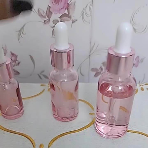 Envases Vacíos de Vidrio Redondos Color Rosa LingKa LK01 para Cosméticos, Cuidado de la Piel, Aceites Esenciales y Sueros, con Gotero y Diseño Serigrafiado - Product Image 5