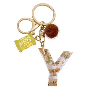 Nieuwe Oranje Bloem Initiële Sleutelhanger Letter Alfabet Sweet Bag Charm Sleutelhanger Ring Llaveros Hars Alfabet Letter Sleutelhangers