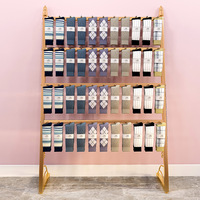 Présentoir de chaussettes personnalisé porte-chaussettes suspendu en métal présentoir présentoir de chaussettes doré de luxe