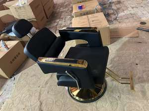 Venta directa de fábrica de sillas de peluquería negras y doradas con reposacabezas y reposabrazos. Ofertas al por mayor disponibles. - Product Image 2