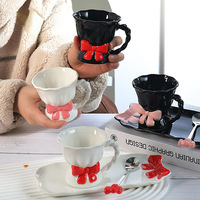 Bow Design Girly comme une jolie tasse en céramique ensemble tasse à café à pied exquise avec assiette à Dessert pour l'utilisation du café domestique et de fête