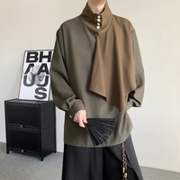 Chemise décontractée pour homme à col montant, manches longues, coupe ample, avec blocs de couleur et détail drapé irrégulier, idéale pour le quotidien