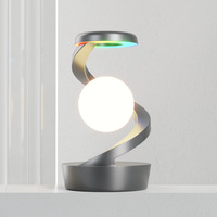2025 nouveau produit chargeur sans fil flottant capteur de lévitation lumière de table lune lampe à suspension rotative pour chambre