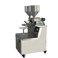Machine industrielle entièrement automatique pour l'application, le lissage et le glaçage de crème, de confiture, de fromage et de mousse sur gâteaux, crêpes et pâtisseries Goodgrain